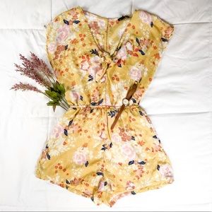 Women’s size small, yellow, floral romper